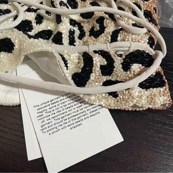 Hand Beaded Bag in Leopard
Ganni bag pouch crossbody sequins - Picture 6 of 10